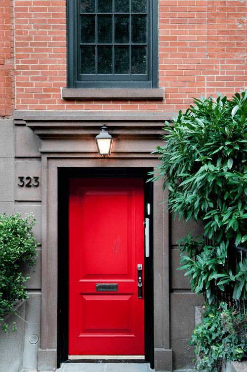 The History And Charm Of A Red Front Door Town Country Living